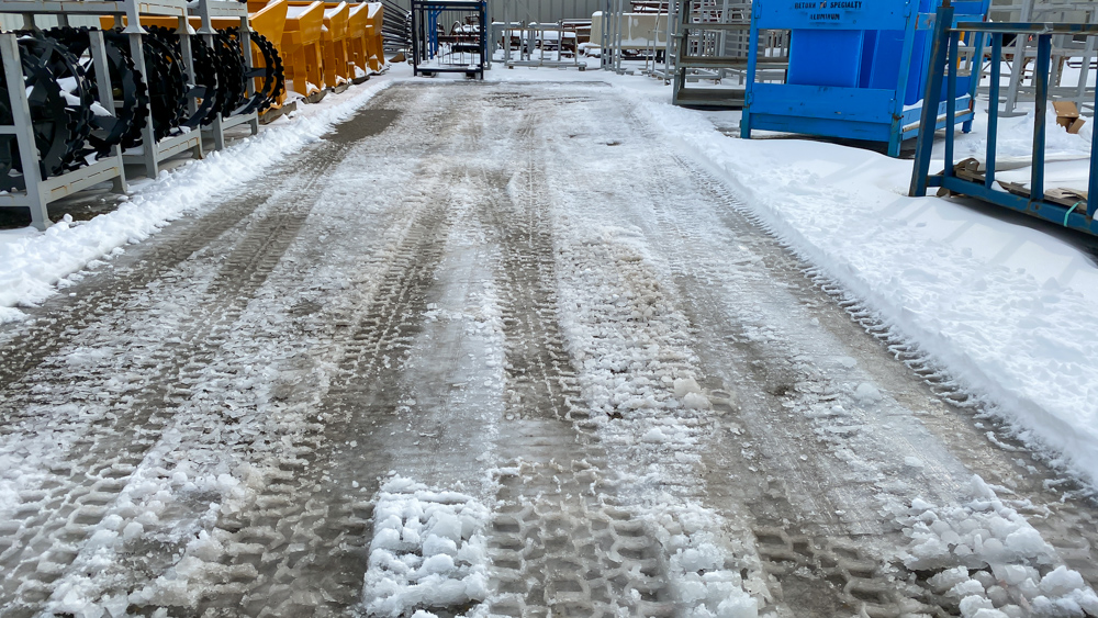 snow on ground after trackless vehicles 5-position folding v-plow attachment on sidewalk tractor